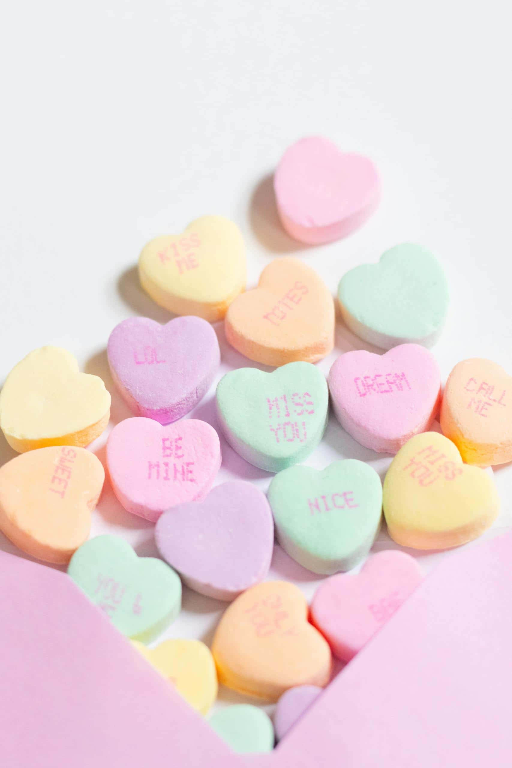 Heart-shaped candies with messages, perfect for Valentine's Day celebrations.